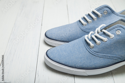 Blue casual urban sneakers. Copy space for text.