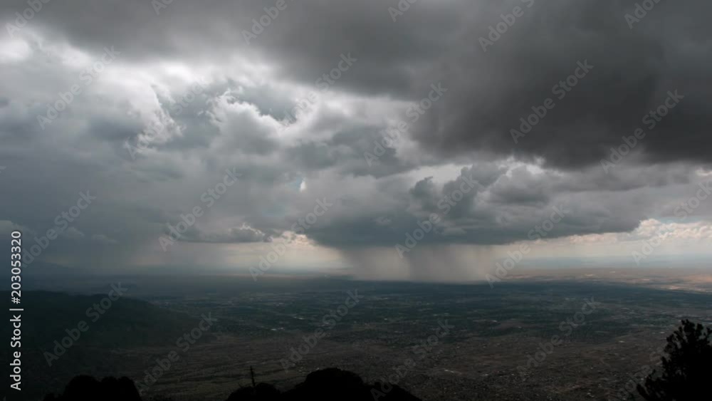 Desert rainstorm seen from mountaintop, time lapse