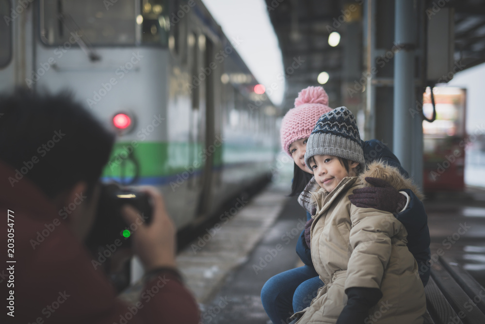 Photographer taking photo of Asian childre