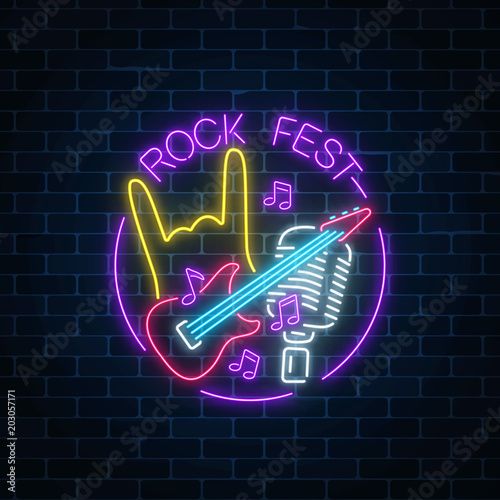 Neon rock festival sign with guitar, microphone and rock gesture in round frame. Live music in open air icon.