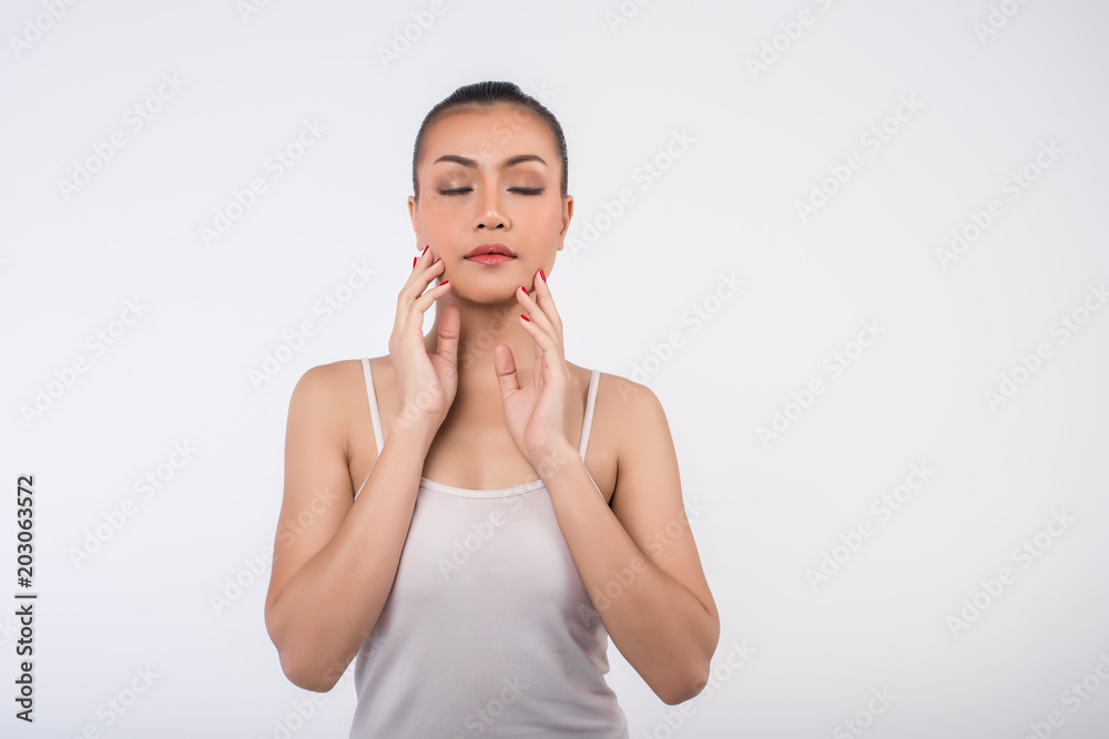 Beautiful Young Woman with Clean Fresh Skin touch own face Beautiful Young Woman with Clean Fresh Skin touch own face