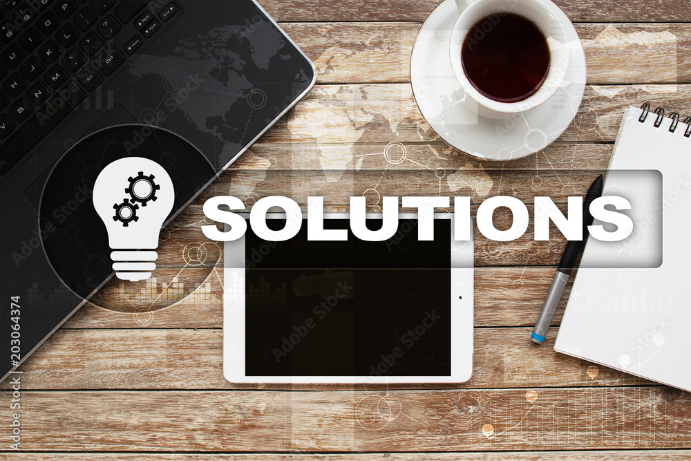 Business solutions concept on the virtual screen. Business solutions concept on the virtual screen.