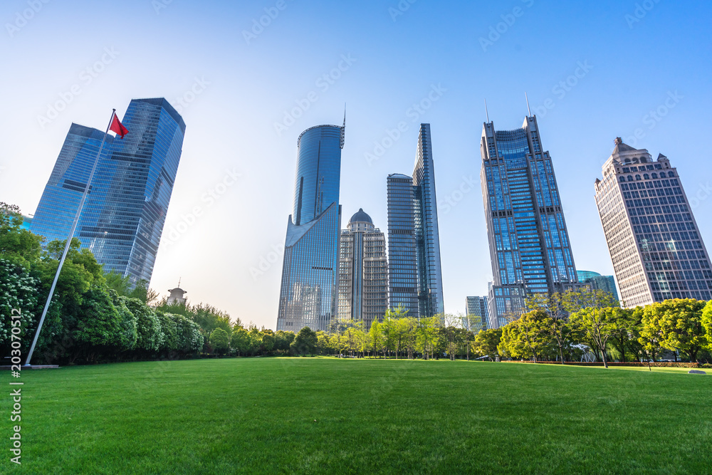 green lawn with modern office building