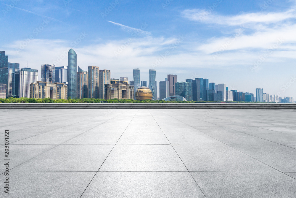 empty marble floor with city skyline