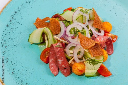 Salad with smoked sausage photo