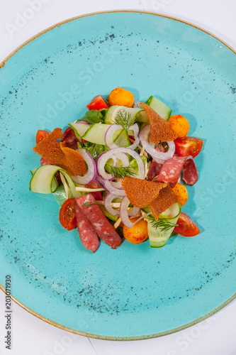 Salad with smoked sausage photo