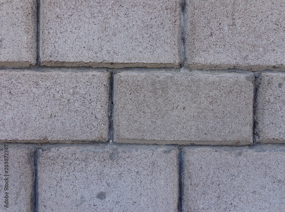 Brick wall. texture. close. A rock. For your design. Brick wall. texture. close. A rock. For your design.