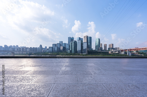 empty marble floor with city skyline © THINK b