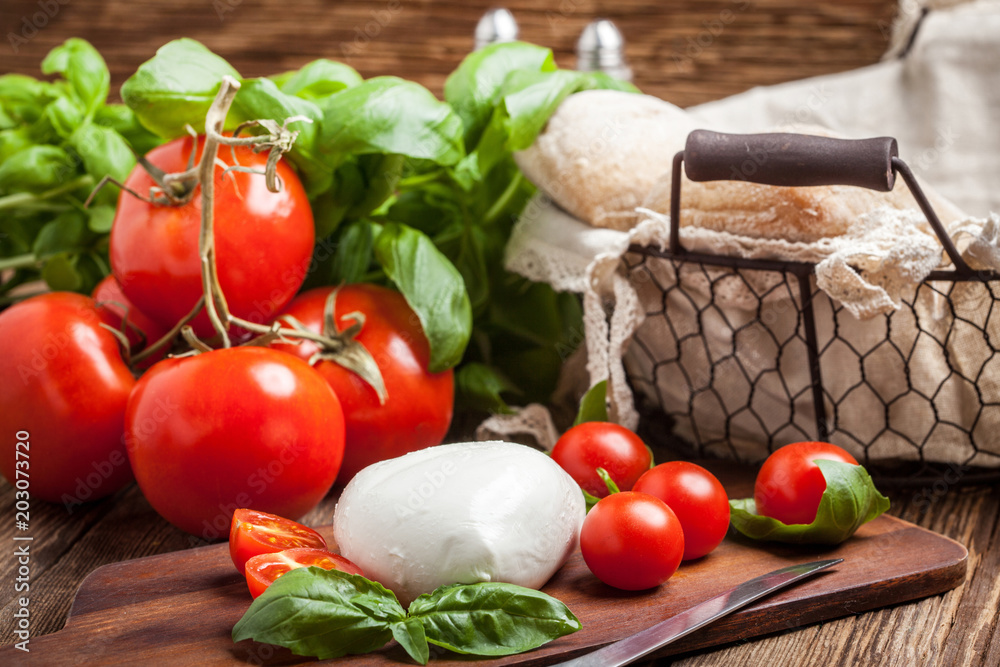 Mozzarella, tomato and basil. Mozzarella, tomato and basil.