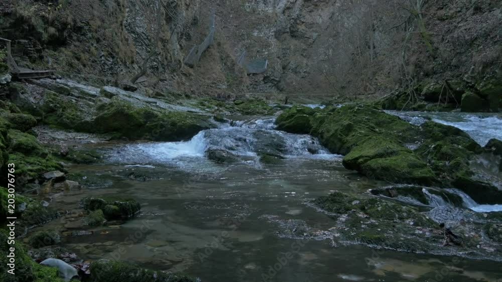 A river flowing through a gorge A river flowing through a gorge