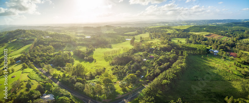 Aerial panorama of countryside with meadows and pastures at sunset in New South Wales, Australia