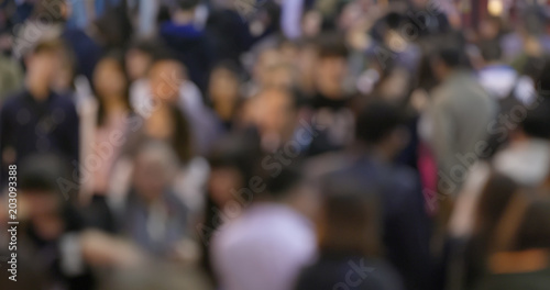 Crowded of people walk in the street at night