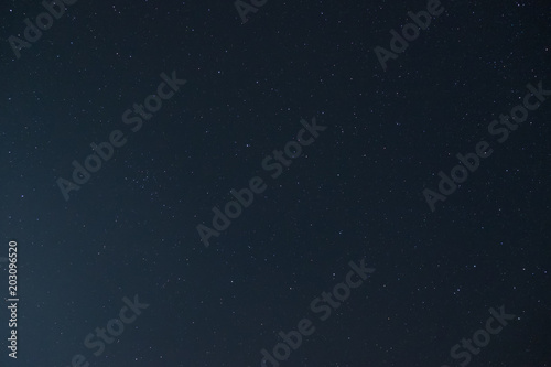 Dark night scene with starry sky