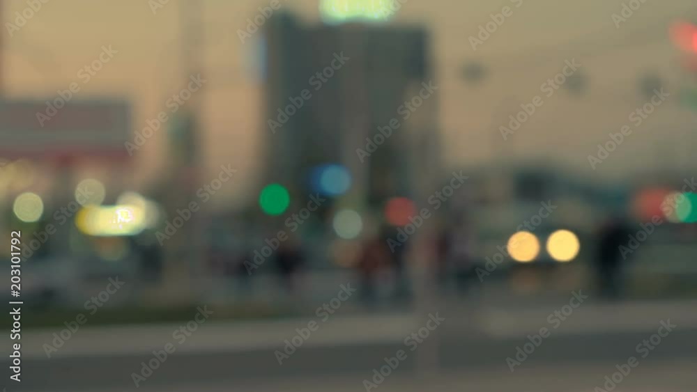 Bokeh car lights in the evening time. Out of focus traffic lights. Bokeh car lights in the evening time. Out of focus traffic lights.