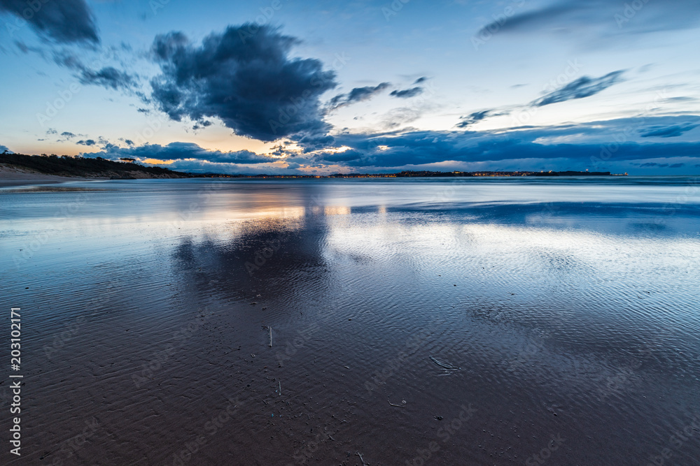 Fototapeta premium Sunset in the Loredo Beach. Cantabria. Spain.
