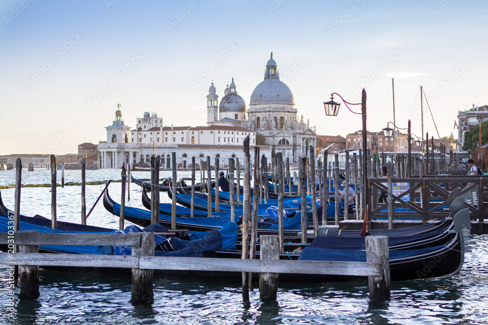 Santa Maria della Salute basilica with gondolas on the Grand canal in Venice, Italy