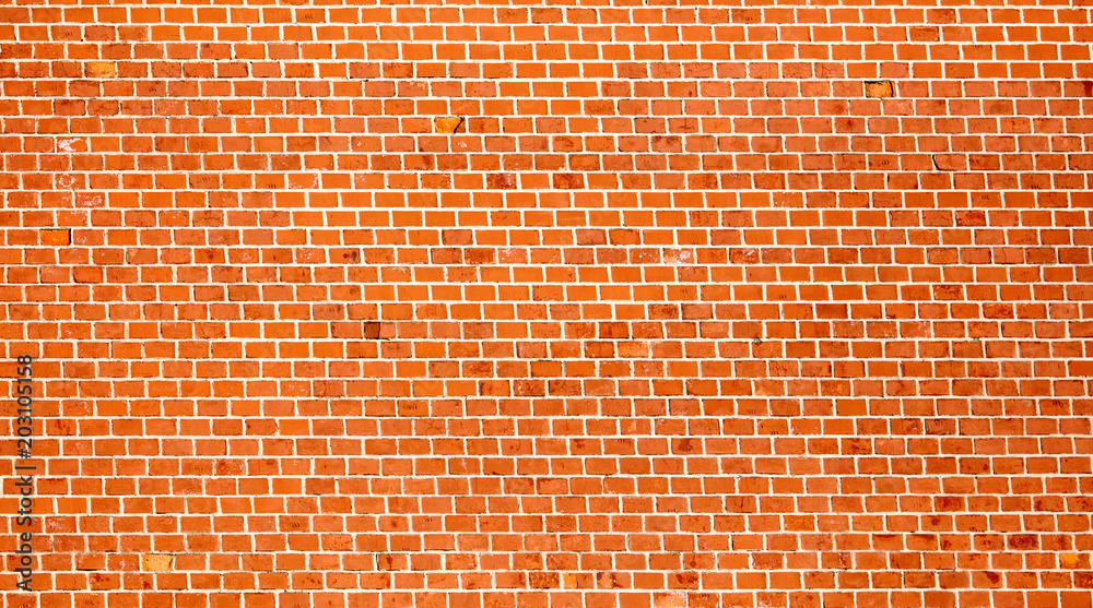 Wall of red bricks as an abstract background Wall of red bricks as an abstract background