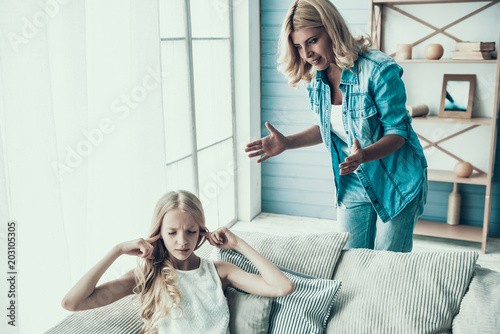 Blonde adult mother brings up naughty girl teenager.