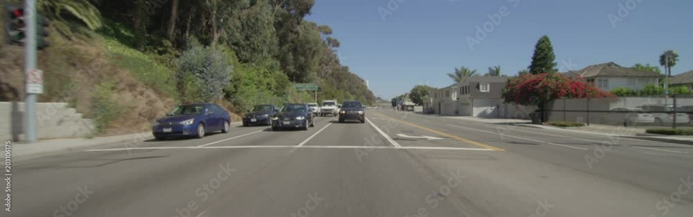 Rear view of a Driving Plate: Car travels on Highway 1 in Santa Monica, California, from Beach House Way to Entrada Drive. Rear view of a Driving Plate: Car travels on Highway 1 in Santa Monica, California, from Beach House Way to Entrada Drive.