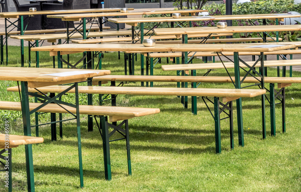 tables and chairs on a lawn to entertain guests outdoors tables and chairs on a lawn to entertain guests outdoors