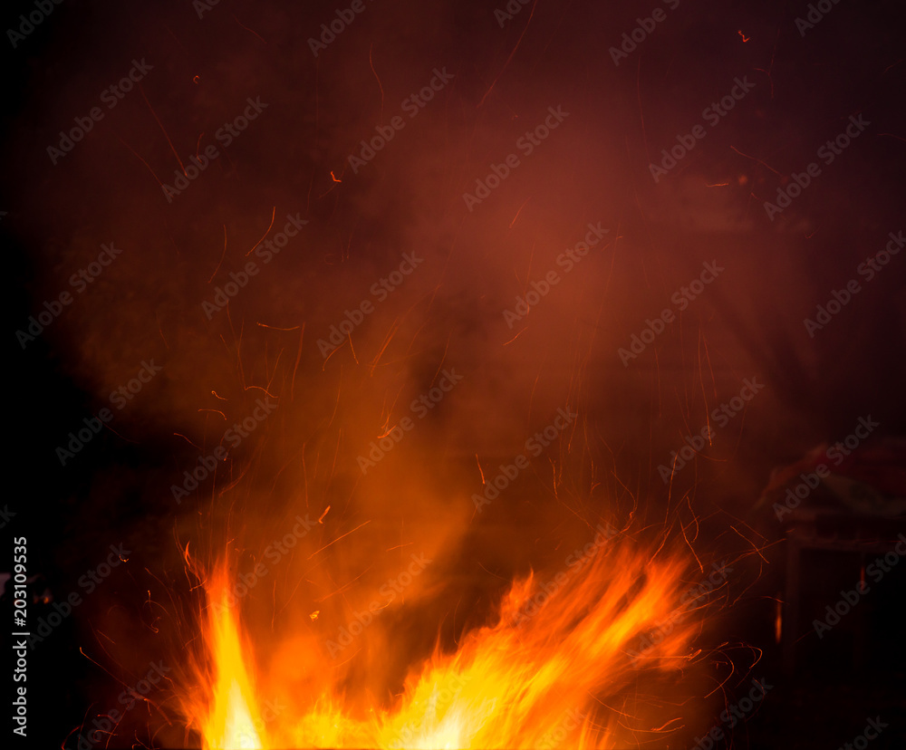 fire with smoke on a black background