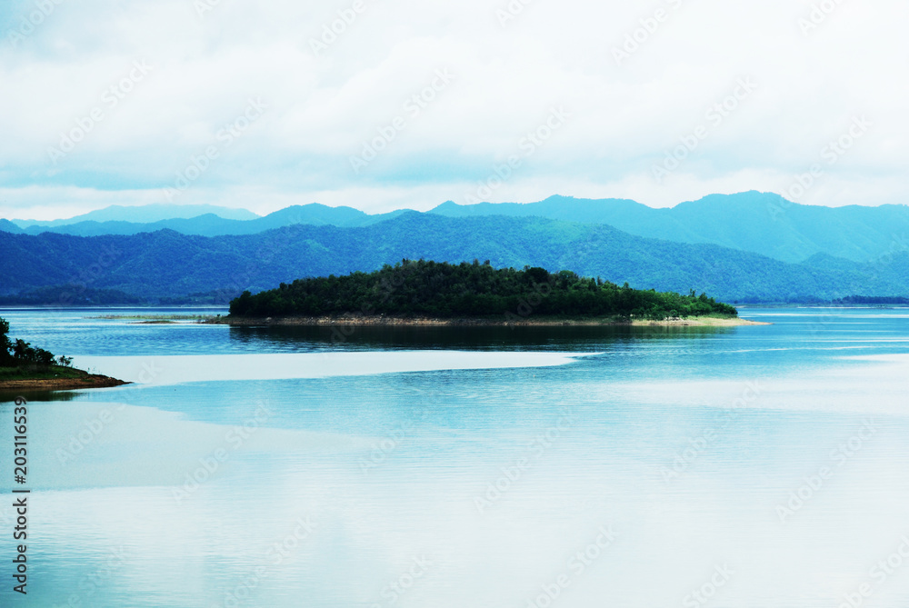 Fototapeta premium Beautiful Mountain range and river lake in Thailand.