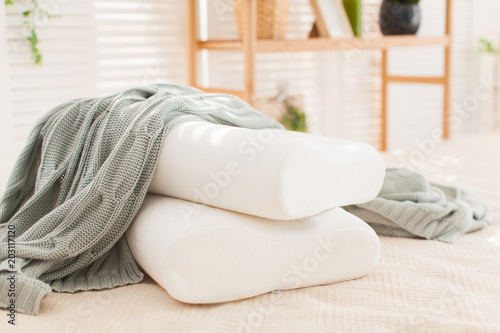 beautiful interior photographs of the modern bedroom, comfortable pillows of orthopedic