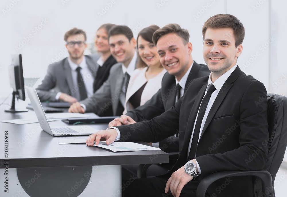 project Manager and professional business team sitting at Desk project Manager and professional business team sitting at Desk