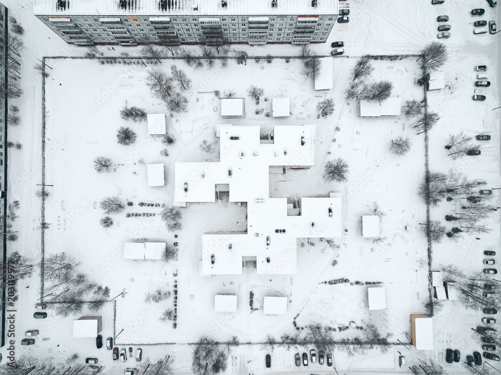 aerial view of the roof of a building in the snow, Lodeynoe Pole, Russia