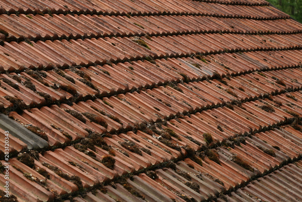 Old tiled roof on a stone house / Details Old tiled roof on a stone house / Details
