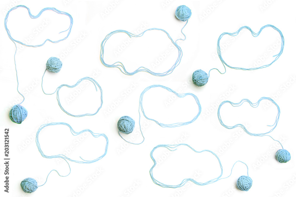 Set of clouds made of blue threads and thread balls isolated on white background. Cotton thread balls with empty frames like clouds. Set of clouds made of blue threads and thread balls isolated on white background. Cotton thread balls with empty frames like clouds.