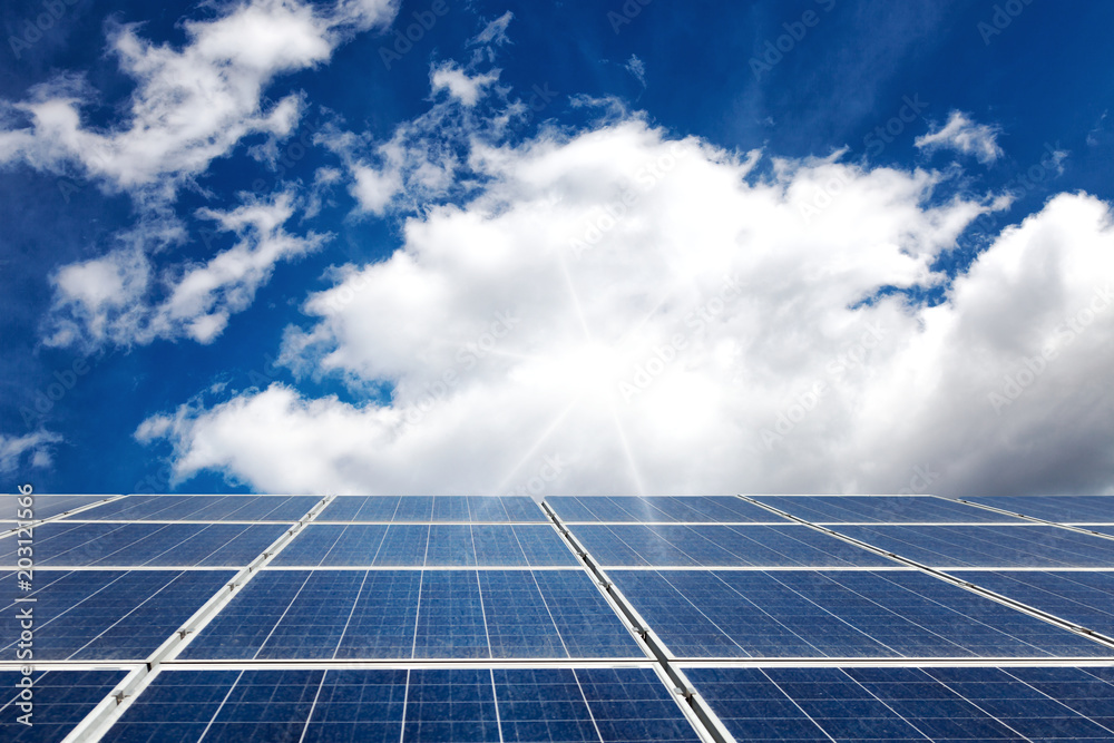 Solar panel in sunlight on sky background