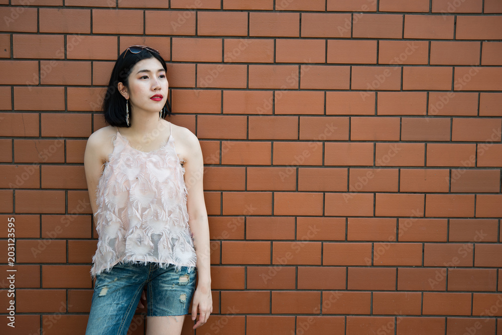 Portrait of beautiful asian chic girl pose for take a picture,Lifestyle of teen thailand people,Modern woman happy concept Portrait of beautiful asian chic girl pose for take a picture,Lifestyle of teen thailand people,Modern woman happy concept