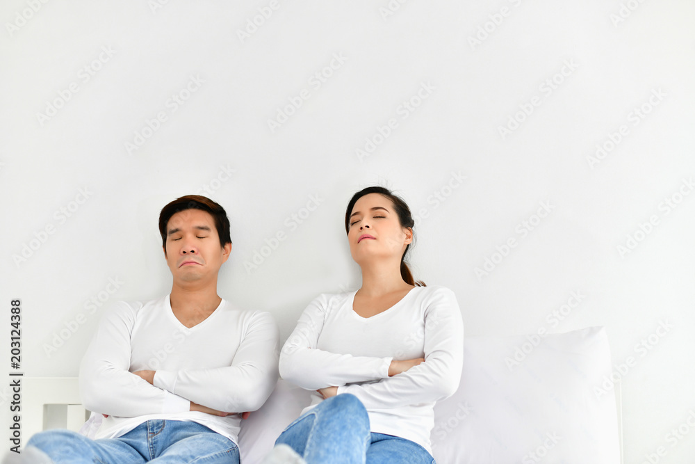 A couple lover is upset about something in the bedroom. A couple lover is upset about something in the bedroom.