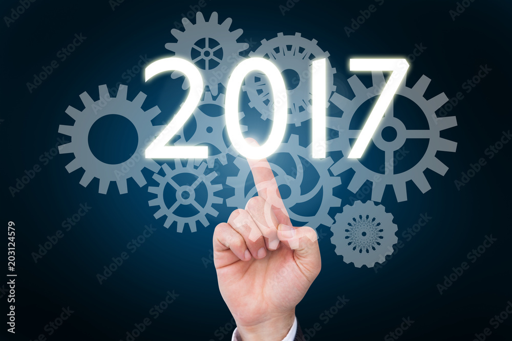 Hand of businessman in suit gesturing against blue background with vignette Hand of businessman in suit gesturing against blue background with vignette