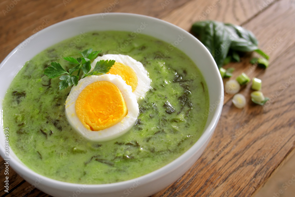Spinach soup with boiled egg.
Spinach soup with boiled egg.