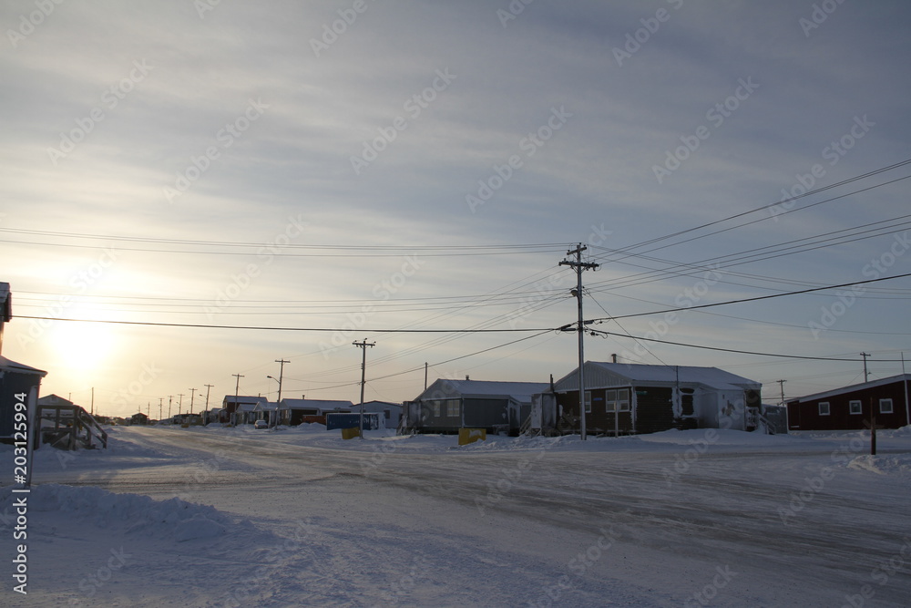 Street view of an arctic community and neigbourhood, located in Arviat, Nunavut Canada