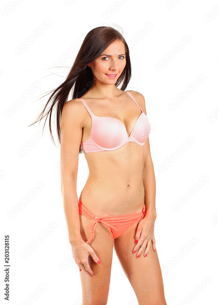 Young brunette woman in bikini underwear isolated on white background. Young brunette woman in bikini underwear isolated on white background.
