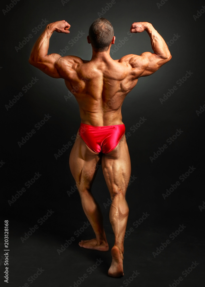 Bodybuilder doing a Back Double Biceps pose-demhanvico.com.vn