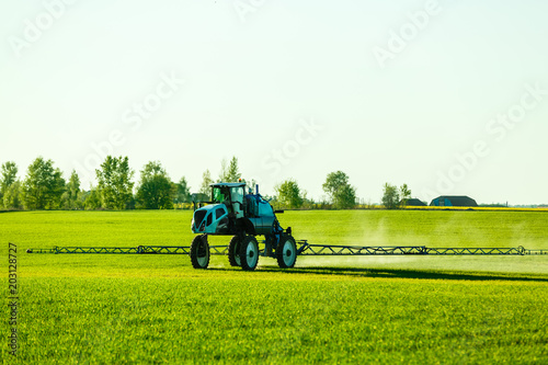 In the agricultural enterprise self-propelled sprayer with GPS-navigation herbicides handle spring field