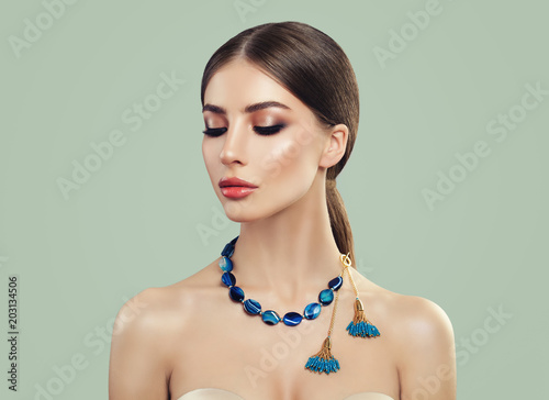 Beautiful Woman wearing Blue Jewelry Necklace
