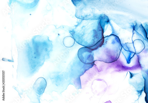 Beautiful abstract watercolor artistic background with stains, spots, blots and splatters. Light blue, cyan, turquoise, violet shades. Hand drawn ink and water colour painting on white backdrop.