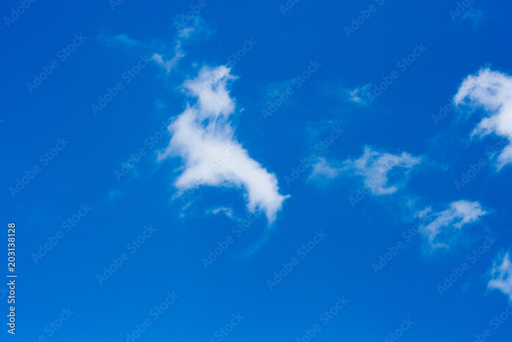 white clouds on a blue spring sky white clouds on a blue spring sky