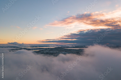 Aerial view of a coast of Ladoga Lake over the fog © Lev Karavanov