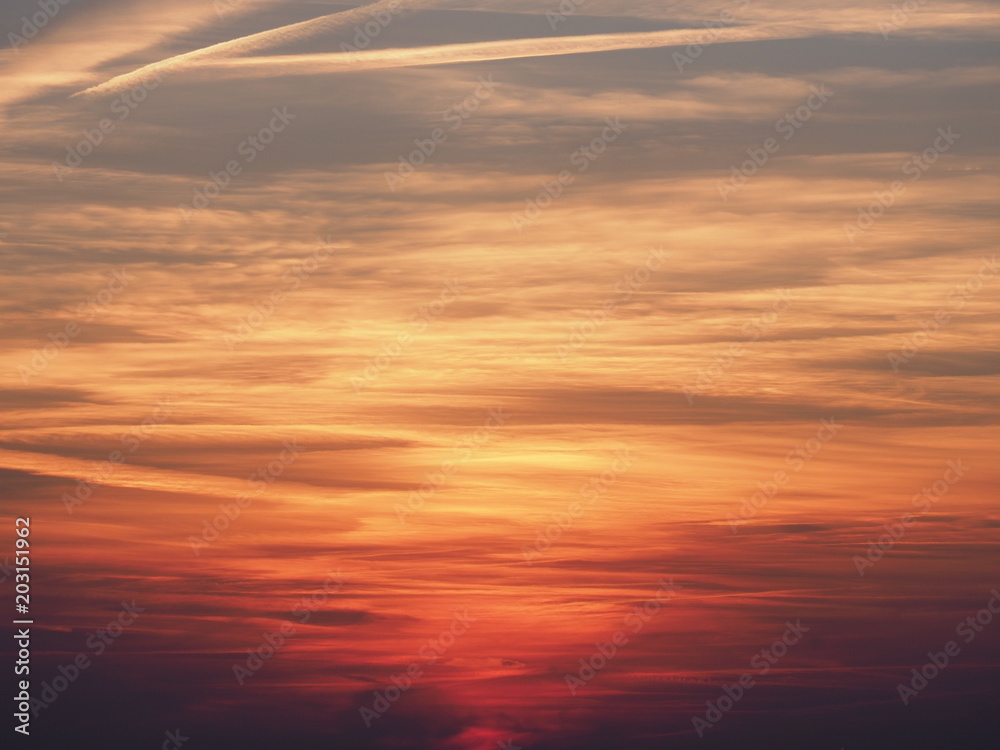 Picturesque colorful sky at sun set with clouds formation seen in spring evening from european city in Poland
