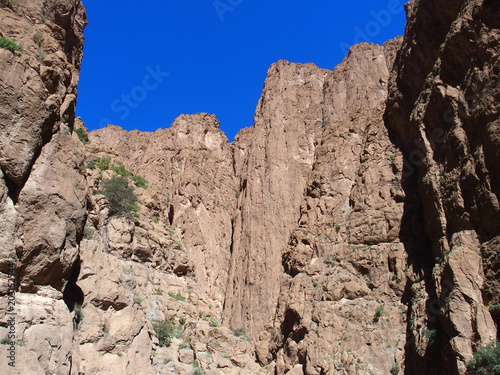 Scenic rocky slope of TODGHA GORGE canyon landscape in MOROCCO at High Atlas Mountains range at Dades Rivers