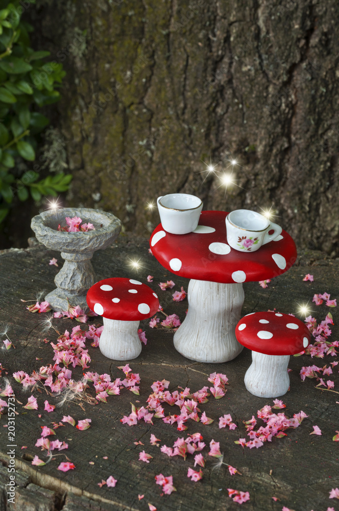 Tea party in forest with fairies on red mushrooms/Celebration with the fairies