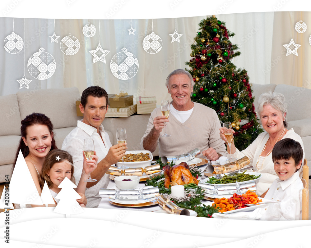 Family toasting with white wine in a Christmas dinner against christmas themed frame