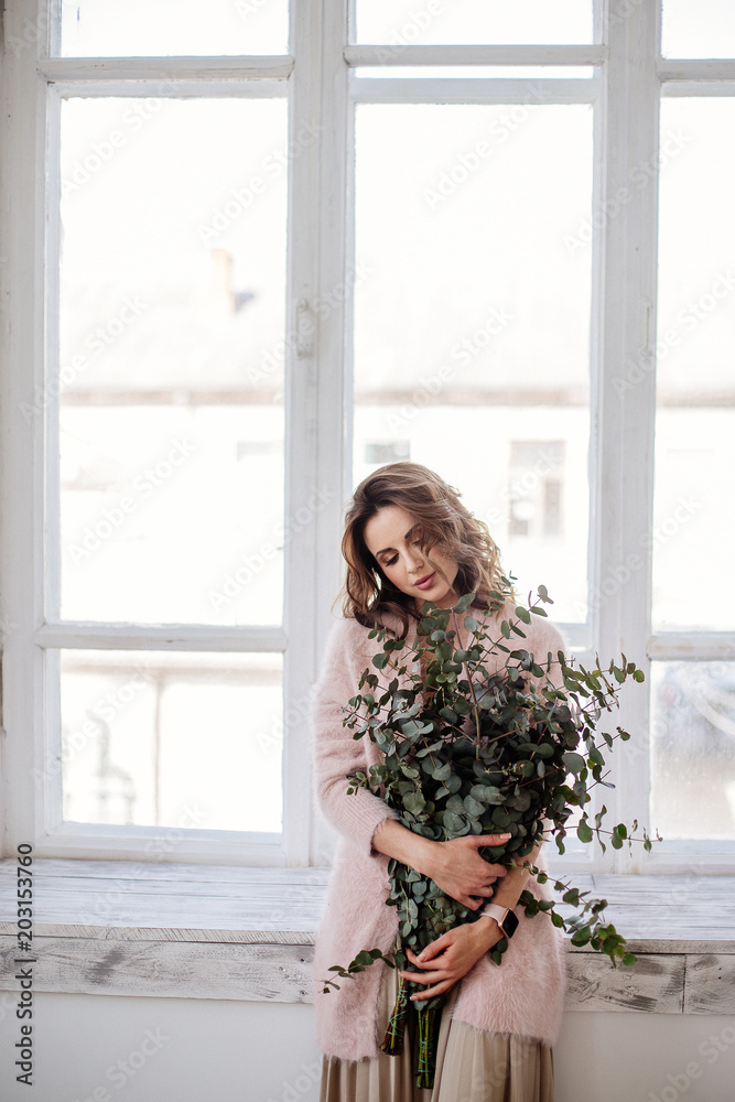 Fototapeta premium Beautiful girl by the window.