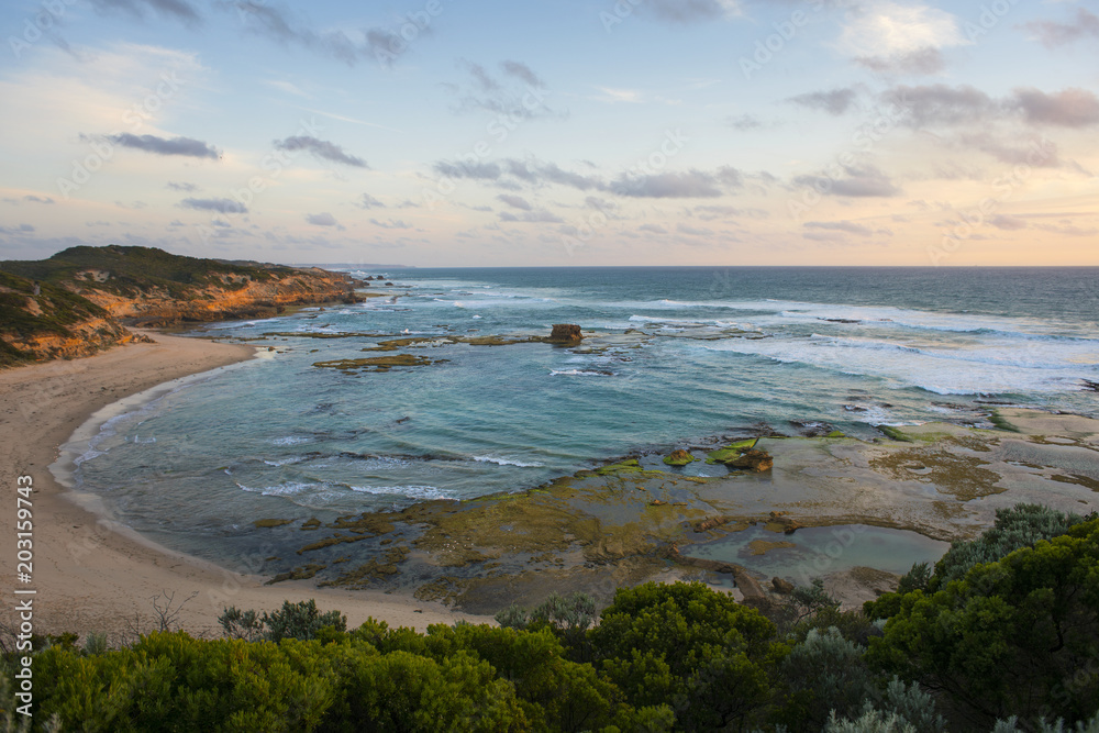 beautiful blue ocean bay at sunset